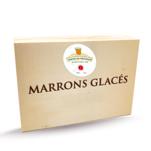 Boite en bois avec la mention de Marrons glacés écrit au milieu de la boite et un stickers avec le logo des comtes de Provence collé dessus
