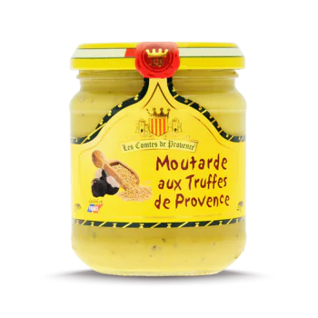 L'image montre un pot de moutarde de la marque "Les Comtes de Provence". Le pot est étiqueté "Moutarde aux Truffes de Provence". L'étiquette est jaune avec des détails noirs et rouges, et présente une illustration de graines de moutarde et de truffes. Le haut du pot est scellé avec un sceau rouge portant les initiales "CP". En bas à gauche de l'étiquette, il est écrit "Cuisiné en France".